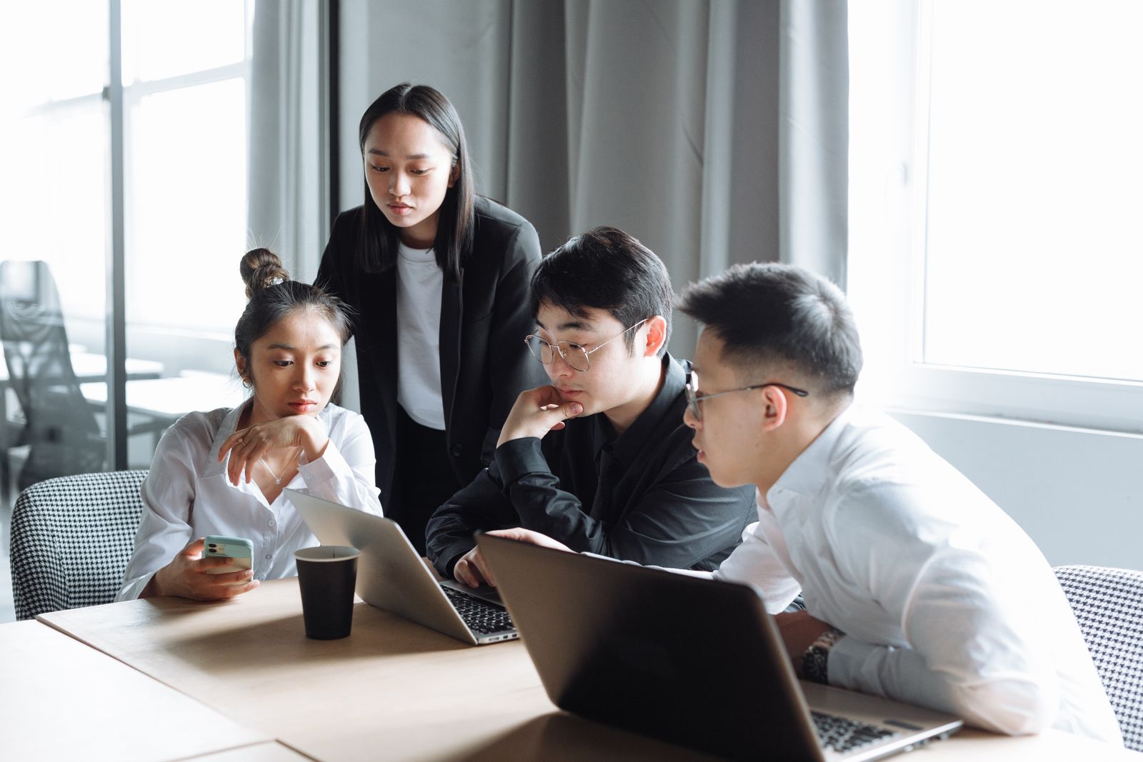 Professionals collaborating in a meeting