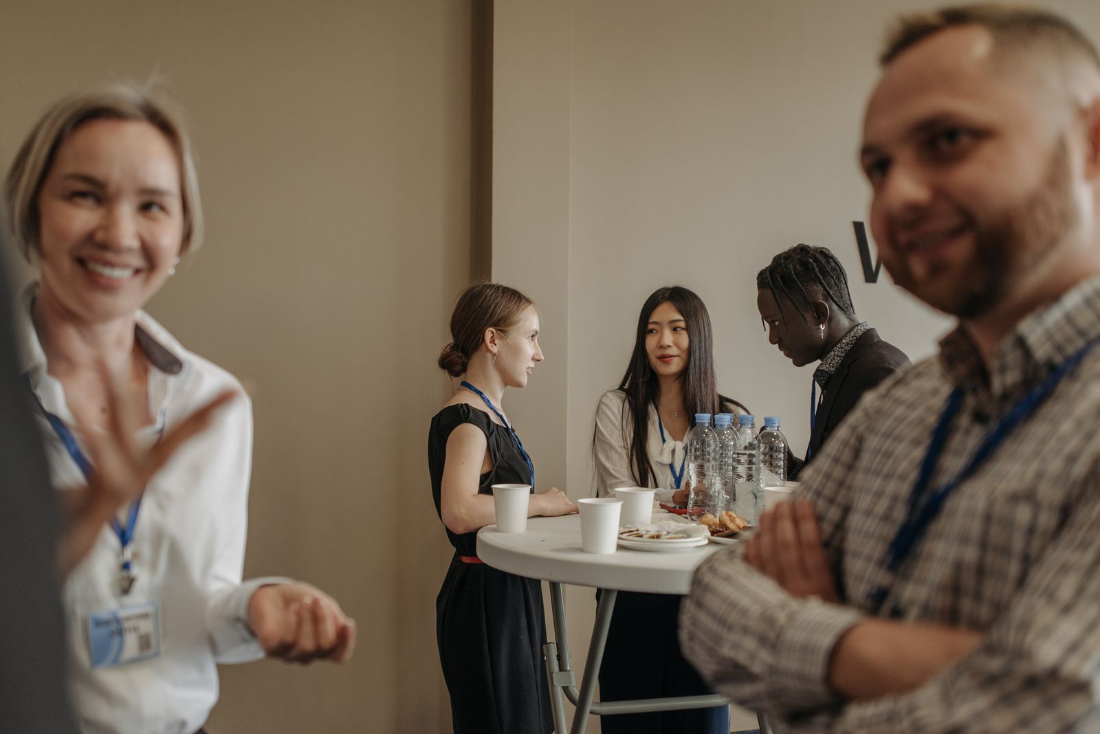 Professionals conversing at a networking event
